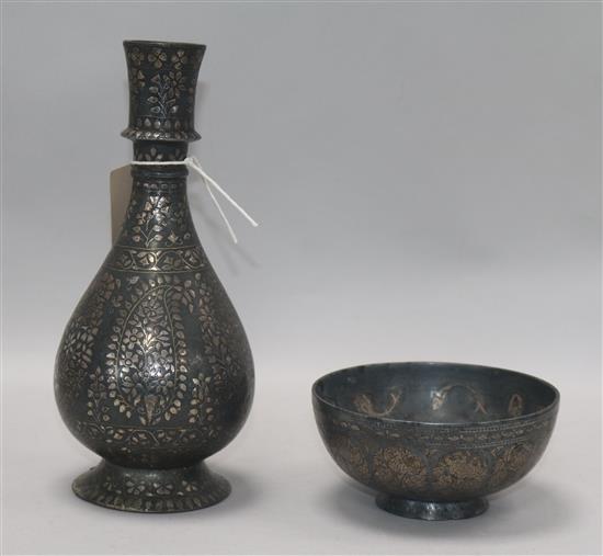 A 19th century Indian Bidri ware bottle vase and a similar bowl vase height 24cm